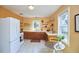 Cozy kitchen features white appliances, light countertops, and wooden cabinetry at 2313 Prince St, Durham, NC 27707