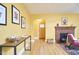 Bright living room with hardwood floors, fireplace, and archway at 2313 Prince St, Durham, NC 27707