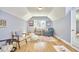 Cozy living room with hardwood floors, vaulted ceiling, and comfortable seating at 2313 Prince St, Durham, NC 27707