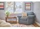 Comfortable reading nook with plush armchair and natural light at 2313 Prince St, Durham, NC 27707