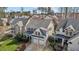 A charming two-story house with a two-car garage and a green lawn at 233 Candia Ln, Cary, NC 27519