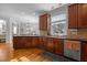 Bright kitchen with natural light, granite counters, and stainless steel appliances at 233 Candia Ln, Cary, NC 27519