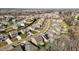 High-angle view showcasing a residential area with neatly arranged houses, streets, and established lawns at 234 Macallan Dr, Burlington, NC 27215