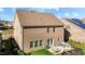 Brick home featuring a patio with outdoor furniture and a small, fenced-in backyard at 234 Macallan Dr, Burlington, NC 27215