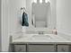 Modern bathroom with a granite countertop, stylish fixtures, and neutral color palette at 234 Macallan Dr, Burlington, NC 27215