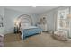 Bedroom features a colorful rainbow wall, daybed, and dresser with a large sunny window at 234 Macallan Dr, Burlington, NC 27215