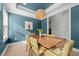 Elegant dining room with modern light fixture and stylish furniture perfect for entertaining at 234 Macallan Dr, Burlington, NC 27215