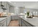 Stylish kitchen with stainless steel appliances, white countertops, and shaker style cabinets at 234 Macallan Dr, Burlington, NC 27215