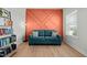 Stylish living room featuring a modern accent wall, comfortable seating, and bright natural light at 234 Macallan Dr, Burlington, NC 27215
