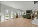 Bright, airy living space leads to kitchen, staircase and outdoor living space at 234 Macallan Dr, Burlington, NC 27215