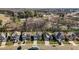Street view of charming homes with well-maintained landscaping and multiple parked cars in driveways at 234 Macallan Dr, Burlington, NC 27215
