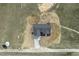 Overhead view of property in sprawling landscape, blending rural serenity with residential comfort at 239 Surles Rd, Benson, NC 27504