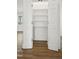 Bright pantry with white shelving provides ample storage at 239 Surles Rd, Benson, NC 27504