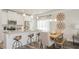 Bright kitchen with stainless appliances, granite countertops, and a breakfast bar adjacent to dining area at 274 Deodora Ln, Cameron, NC 28326