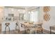Open-concept kitchen and dining area featuring granite countertops and stainless steel appliances at 274 Deodora Ln, Cameron, NC 28326