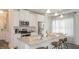 Modern kitchen featuring stainless steel appliances, white cabinets, and a granite countertop island at 274 Deodora Ln, Cameron, NC 28326