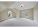 Spacious bedroom featuring two windows, carpeting, and neutral paint at 2803 Cameron Pond Dr, Cary, NC 27519