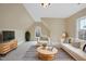 Bonus room featuring a vaulted ceiling, plenty of sunlight, and unique architecture at 2803 Cameron Pond Dr, Cary, NC 27519