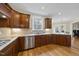 Spacious kitchen featuring custom cabinetry, granite countertops, and stainless steel appliances at 2803 Cameron Pond Dr, Cary, NC 27519