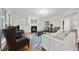 Inviting living room with fireplace, TV, and stylish furniture at 2803 Cameron Pond Dr, Cary, NC 27519