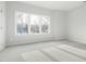 Bright, spacious bedroom with large windows offering abundant natural light at 2816 Cascadilla St, Durham, NC 27704