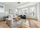 Bright living area with ample natural light, stylish decor, and a welcoming atmosphere for relaxation and social gatherings at 2816 Cascadilla St, Durham, NC 27704