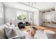 Inviting living area with hardwood floors, modern furnishings, and stylish decor, perfect for relaxing and entertaining guests at 2816 Cascadilla St, Durham, NC 27704