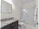 Modern bathroom features a sleek vanity and a frameless glass-enclosed shower at 3204 Cobblestone Ct, Raleigh, NC 27607