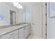 Bathroom with blue walls, granite countertops, and white cabinets at 3204 Cobblestone Ct, Raleigh, NC 27607