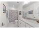 Bright bathroom featuring granite counters, a bathtub, and plenty of storage space at 3204 Cobblestone Ct, Raleigh, NC 27607