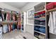 Spacious walk-in closet with custom shelving and hanging racks for optimal organization at 3204 Cobblestone Ct, Raleigh, NC 27607