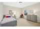 Comfortable bedroom painted with neutral colors and featuring a full size bed with a window view at 3609 Kilgo Dr, Durham, NC 27705