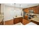 Kitchen features granite countertops, stainless steel appliances and a center island at 3609 Kilgo Dr, Durham, NC 27705