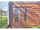 Exterior of brown building with double doors, perfect for storage and organization at 3609 Kilgo Dr, Durham, NC 27705