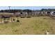 Large backyard with a fire pit and garden beds at 38 Winter Red Way, Benson, NC 27504