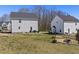 Spacious backyard with patio, fire pit, and fenced perimeter at 38 Winter Red Way, Benson, NC 27504