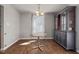 Cozy dining area featuring an accent wall and hardwood floor, perfect for intimate gatherings at 38 Winter Red Way, Benson, NC 27504