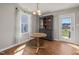 Cozy dining area featuring an accent wall and hardwood floor, perfect for intimate gatherings at 38 Winter Red Way, Benson, NC 27504