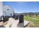 Back patio with outdoor seating, BBQ, and a view of the backyard at 38 Winter Red Way, Benson, NC 27504
