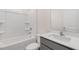 Full bathroom features a tub and shower combination, a vanity with gray cabinets, and a toilet at 42 Sweet Meadow Rd, Angier, NC 27501