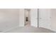 Bedroom view with an open doorway to a bathroom and a closet at 42 Sweet Meadow Rd, Angier, NC 27501