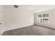 Bright bedroom with luxury vinyl plank flooring and large window to backyard at 42 Sweet Meadow Rd, Angier, NC 27501