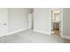 This bedroom leads into a bathroom and has an open closet at 4513 Bridle Run Dr, Raleigh, NC 27606