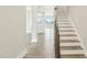 Inviting entryway featuring hardwood floors, stairs, and an open floor plan at 4513 Bridle Run Dr, Raleigh, NC 27606