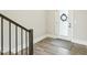 Foyer with a door and mat, luxury vinyl plank flooring and neutral paint at 4513 Bridle Run Dr, Raleigh, NC 27606