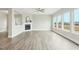 Spacious living room featuring a fireplace, neutral paint, luxury vinyl plank flooring and lots of light at 4513 Bridle Run Dr, Raleigh, NC 27606