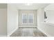 Bright room with hardwood floors and views from windows at 4513 Bridle Run Dr, Raleigh, NC 27606