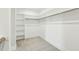 Walk-in closet featuring built in shelving at 4513 Bridle Run Dr, Raleigh, NC 27606