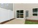 Back patio with sliding glass door and white fence at 46 Sweet Meadow Rd, Angier, NC 27501
