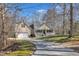 Charming two-story home features a welcoming front porch and attached two-car garage at 484 Galaxy Dr, Garner, NC 27529